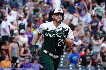 Jul 3, 2022; Denver, Colorado, USA;    Colorado Rockies designated hitter C.J. Cron (25) runs off a three-run home run with in the eighth against the Arizona Diamondbacks at Coors Field. Mandatory Credit: Ron Chenoy-USA TODAY Sports