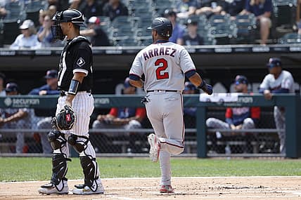 Jul 6, 2022; Chicago, Illinois, USA; Minnesota Twins first baseman Luis Arraez (2) scores against the Chicago White Sox during the first inning at Guaranteed Rate Field. Mandatory Credit: Kamil Krzaczynski-USA TODAY Sports