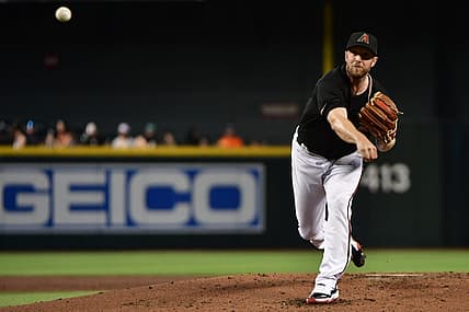 Jul 6, 2022; Phoenix, Arizona, USA; Arizona Diamondbacks starting pitcher Merrill Kelly (29) throws a pitch in the second inning against the San Francisco Giants at Chase Field. Mandatory Credit: Matt Kartozian-USA TODAY Sports