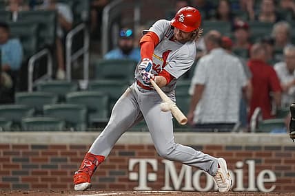 Jul 7, 2022; Cumberland, Georgia, USA; St. Louis Cardinals third baseman Brendan Donovan (33) singles against the Atlanta Braves during the tenth inning at Truist Park. Mandatory Credit: Dale Zanine-USA TODAY Sports