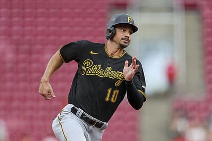 Jul 7, 2022; Cincinnati, Ohio, USA; Pittsburgh Pirates center fielder Bryan Reynolds (10) runs to third on a double hit by designated hitter Daniel Vogelbach (not pictured) in the first inning against against the Cincinnati Reds at Great American Ball Park. Mandatory Credit: Katie Stratman-USA TODAY Sports