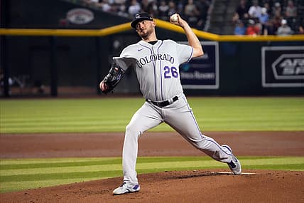 Jul 7, 2022; Phoenix, Arizona, USA; Colorado Rockies starting pitcher Austin Gomber (26) pitches against the Arizona Diamondbacks during the first inning at Chase Field. Mandatory Credit: Joe Camporeale-USA TODAY Sports