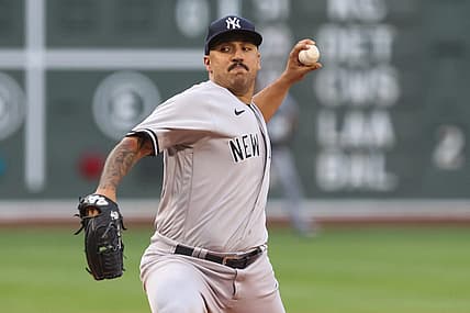 Jul 8, 2022; Boston, Massachusetts, USA; New York Yankees starting pitcher Nestor Cortes (65) throws a pitch against the Boston Red Sox during the first inning at Fenway Park. Mandatory Credit: Paul Rutherford-USA TODAY Sports