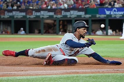 Jul 8, 2022; Arlington, Texas, USA; Minnesota Twins center fielder Byron Buxton (25) steals third base against the Texas Rangers during the third inning at Globe Life Field. Mandatory Credit: Jim Cowsert-USA TODAY Sports