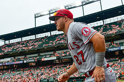 Jul 9, 2022; Baltimore, Maryland, USA;  Los Angeles Angels center fielder Mike Trout (27) runs on the the field before the game against the Baltimore Orioles at Oriole Park at Camden Yards. Mandatory Credit: Tommy Gilligan-USA TODAY Sports