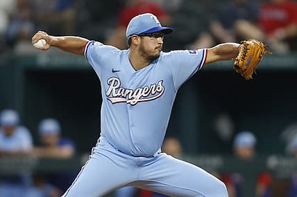 Jul 10, 2022; Arlington, Texas, USA; Texas Rangers starting pitcher Dane Dunning (33) throws a pitch against the Minnesota Twins in the first inning at Globe Life Field. Mandatory Credit: Tim Heitman-USA TODAY Sports