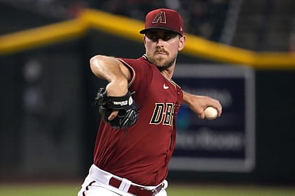 Jul 10, 2022; Phoenix, Arizona, USA; Arizona Diamondbacks starting pitcher Tyler Gilbert (49) pitches against the Colorado Rockies during the first inning at Chase Field. Mandatory Credit: Joe Camporeale-USA TODAY Sports