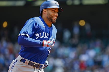 Jul 10, 2022; Seattle, Washington, USA; Toronto Blue Jays designated hitter George Springer (4) runs the bases after hitting a solo-home run against the Seattle Mariners during the first inning at T-Mobile Park. Mandatory Credit: Joe Nicholson-USA TODAY Sports