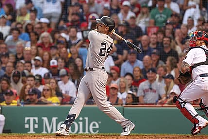 Jul 10, 2022; Boston, Massachusetts, USA; New York Yankees designated hitter Matt Carpenter (24) hits a home run during the third inning against the Boston Red Sox at Fenway Park. Mandatory Credit: Paul Rutherford-USA TODAY Sports