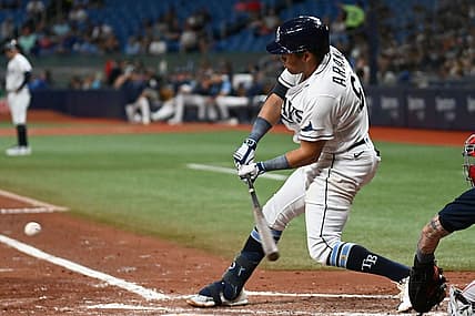 Jul 11, 2022; St. Petersburg, Florida, USA; Tampa Bay Rays second baseman Jonathan Aranda (62) hits a RBI single in the second inning against the Boston Red Sox at Tropicana Field. Mandatory Credit: Jonathan Dyer-USA TODAY Sports
