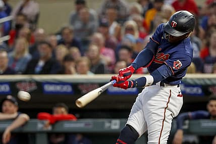 Jul 12, 2022; Minneapolis, Minnesota, USA; Minnesota Twins left fielder Nick Gordon (1) hits an RBI double against the Milwaukee Brewers in the fourth inning to tie the game at Target Field. Mandatory Credit: Bruce Kluckhohn-USA TODAY Sports