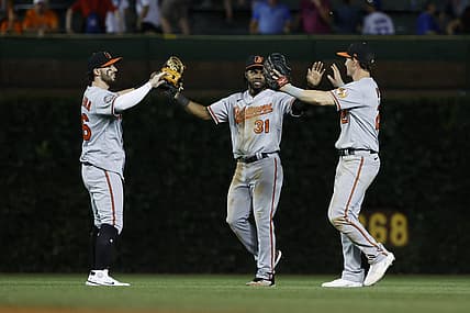 Jul 12, 2022; Chicago, Illinois, USA; Baltimore Orioles players celebrate teams win against the Chicago Cubs at Wrigley Field. Mandatory Credit: Kamil Krzaczynski-USA TODAY Sports