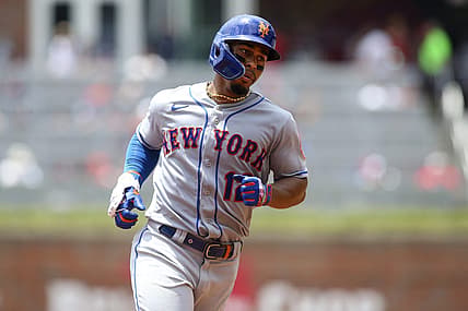 Jul 13, 2022; Atlanta, Georgia, USA; New York Mets shortstop Francisco Lindor (12) rounds third after a three-run home run against the Atlanta Braves in the third inning at Truist Park. Mandatory Credit: Brett Davis-USA TODAY Sports
