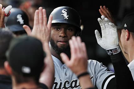 Jul 14, 2022; Minneapolis, Minnesota, USA; Chicago White Sox center fielder Luis Robert (88) celebrates his grand slam home run against the Minnesota Twins in the fourth inning at Target Field. Mandatory Credit: Bruce Kluckhohn-USA TODAY Sports