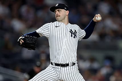 Jul 14, 2022; Bronx, New York, USA; New York Yankees relief pitcher Lucas Luetge (63) pitches against the Cincinnati Reds during the tenth inning at Yankee Stadium. Mandatory Credit: Brad Penner-USA TODAY Sports