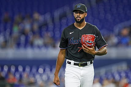 Jul 15, 2022; Miami, Florida, USA; Miami Marlins starting pitcher Sandy Alcantara (22) returns to the dugout after the first inning of the game against the Philadelphia Phillies at loanDepot Park. Mandatory Credit: Sam Navarro-USA TODAY Sports