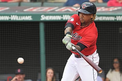Jul 15, 2022; Cleveland, Ohio, USA; Cleveland Guardians third baseman Jose Ramirez (11) hits an RBI single during the first inning against the Detroit Tigers at Progressive Field. Mandatory Credit: Ken Blaze-USA TODAY Sports