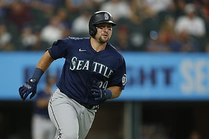 Jul 17, 2022; Arlington, Texas, USA; Seattle Mariners catcher Cal Raleigh (29) rounds the bases after hitting a two-run home run in the fourth inning against the Texas Rangers at Globe Life Field. Mandatory Credit: Tim Heitman-USA TODAY Sports