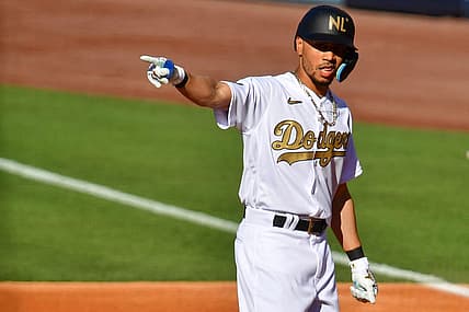 Jul 19, 2022; Los Angeles, California, USA; National League outfielder Mookie Betts (50) of the Los Angeles Dodgers reacts after hitting an RBI double against the American League during the first inning of the 2022 MLB All Star Game at Dodger Stadium. Mandatory Credit: Gary Vasquez-USA TODAY Sports