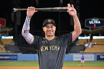 Jul 19, 2022; Los Angeles, California, USA; American League outfielder Giancarlo Stanton (27) of the New York Yankees celebrates after being named Ted Williams most valuable player of the 2022 All Star game at Dodger Stadium. Mandatory Credit: Jayne Kamin-Oncea-USA TODAY Sports