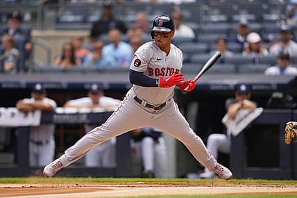 Jul 17, 2022; Bronx, New York, USA; Boston Red Sox third baseman Rafael Devers (11) reacts to an inside pitch during the first inning against the New York Yankees at Yankee Stadium. Mandatory Credit: Gregory Fisher-USA TODAY Sports