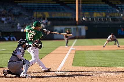 Jul 21, 2022; Oakland, California, USA;  Oakland Athletics catcher Sean Murphy (12) hits a three run home run during the sixth inning against the Detroit Tigers at RingCentral Coliseum. Mandatory Credit: Stan Szeto-USA TODAY Sports