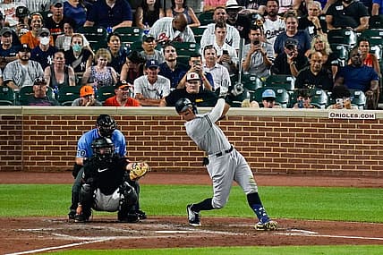 Jul 22, 2022; Baltimore, Maryland, USA;  New York Yankees center fielder Aaron Judge (99) swings through a solo home run against the Baltimore Orioles at Oriole Park at Camden Yards. Mandatory Credit: Tommy Gilligan-USA TODAY Sports