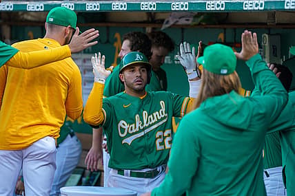 Jul 22, 2022; Oakland, California, USA;  Oakland Athletics right fielder Ramon Laureano (22) celebrates with teammate in the dugout after the home run during the fifth inning against the Texas Rangers at RingCentral Coliseum. Mandatory Credit: Neville E. Guard-USA TODAY Sports