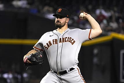 Jul 26, 2022; Phoenix, Arizona, USA; San Francisco Giants starting pitcher Carlos Rodon (16) throws against the Arizona Diamondbacks in the first inning at Chase Field. Mandatory Credit: Rick Scuteri-USA TODAY Sports