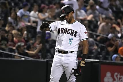 Jul 26, 2022; Phoenix, Arizona, USA; Arizona Diamondbacks left fielder David Peralta (6) reacts after hitting an RBI triple against the San Francisco Giants in the eighth inning at Chase Field. Mandatory Credit: Rick Scuteri-USA TODAY Sports