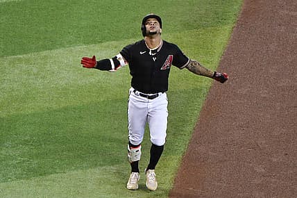 Jul 27, 2022; Phoenix, Arizona, USA; Arizona Diamondbacks second baseman Ketel Marte (4) celebrates after hitting a solo home run in the first inning against the San Francisco Giants at Chase Field. Mandatory Credit: Matt Kartozian-USA TODAY Sports