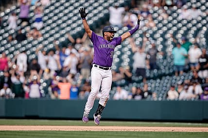 Jul 27, 2022; Denver, Colorado, USA; Colorado Rockies catcher Elias Diaz (35) reacts after hitting a walk-off two RBI single in the ninth inning against the Chicago White Sox at Coors Field. Mandatory Credit: Isaiah J. Downing-USA TODAY Sports