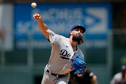Jul 31, 2022; Denver, Colorado, USA; Los Angeles Dodgers starting pitcher Tony Gonsolin (26) pitches in the first inning against the Colorado Rockies at Coors Field. Mandatory Credit: Isaiah J. Downing-USA TODAY Sports
