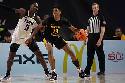 Montverde Academy's Kwame Evans Jr. (13) backs down IMG Academy's Eric Dailey Jr. (3) during the second half of the GEICO Nationals semifinal between Montverde Academy and IMG Academy, Friday, April 1, 2022, at Suncoast Credit Union Arena in Fort Myers, Fla.Montverde Academy defeated IMG Academy 62-57.

GEICO Nationals 2022: Montverde Academy (Fla.) vs. IMG Academy (Fla.) semifinal, April 1, 2022