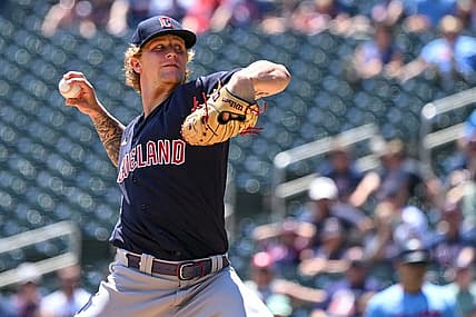 Jun 23, 2022; Minneapolis, Minnesota, USA;  Cleveland Guardians starting pitcher Zach Plesac (34) delivers a pitch against the Minnesota Twins during the first inning at Target Field. Mandatory Credit: Nick Wosika-USA TODAY Sports