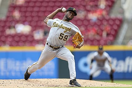 Jul 7, 2022; Cincinnati, Ohio, USA; Pittsburgh Pirates starting pitcher Roansy Contreras (59) pitches against the Cincinnati Reds in the second inning at Great American Ball Park. Mandatory Credit: Katie Stratman-USA TODAY Sports