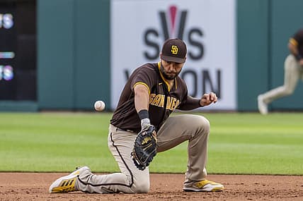 Jul 25, 2022; Detroit, Michigan, USA; San Diego Padres first baseman Eric Hosmer (30) makes a fielding error during the third inning on a ground ball from Detroit Tigers first baseman Harold Castro (30) at Comerica Park. Mandatory Credit: Raj Mehta-USA TODAY Sports
