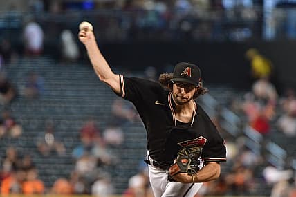 Jul 27, 2022; Phoenix, Arizona, USA; Arizona Diamondbacks starting pitcher Zac Gallen (23) throws in the fifth inning against the San Francisco Giants at Chase Field. Mandatory Credit: Matt Kartozian-USA TODAY Sports
