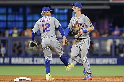 Jul 31, 2022; Miami, Florida, USA; New York Mets shortstop Francisco Lindor (12) celebrates with left fielder Mark Canha (19) after winning the game against the Miami Marlins at loanDepot Park. Mandatory Credit: Sam Navarro-USA TODAY Sports