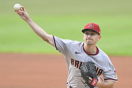 Aug 1, 2022; Cleveland, Ohio, USA; Arizona Diamondbacks starting pitcher Zach Davies (27) delivers a pitch in the first inning against the Cleveland Guardians at Progressive Field. Mandatory Credit: David Richard-USA TODAY Sports