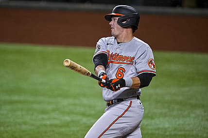 Aug 1, 2022; Arlington, Texas, USA; Baltimore Orioles first baseman Ryan Mountcastle (6) hits a single and drives in a run against the Texas Rangers during the second inning at Globe Life Field. Mandatory Credit: Jerome Miron-USA TODAY Sports