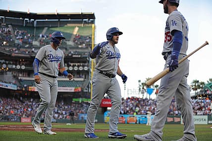 Aug 1, 2022; San Francisco, California, USA;  Los Angeles Dodgers third baseman Max Muncy (13) celebrates with center fielder Cody Bellinger (35) after hitting a two run home run during the second inning against the San Francisco Giants at Oracle Park. Mandatory Credit: Sergio Estrada-USA TODAY Sports