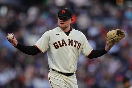 Aug 1, 2022; San Francisco, California, USA; San Francisco Giants starting pitcher Logan Webb (62) reacts during the second inning against the Los Angeles Dodgers at Oracle Park. Mandatory Credit: Sergio Estrada-USA TODAY Sports