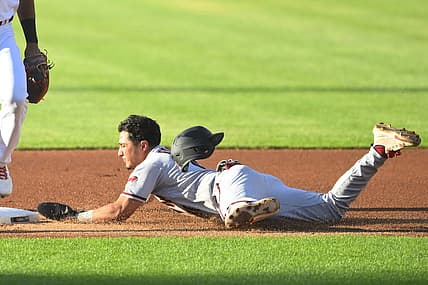 Aug 2, 2022; Cleveland, Ohio, USA; Arizona Diamondbacks third baseman Josh Rojas (10) steals second base in the first inning against the Cleveland Guardians at Progressive Field. Mandatory Credit: David Richard-USA TODAY Sports