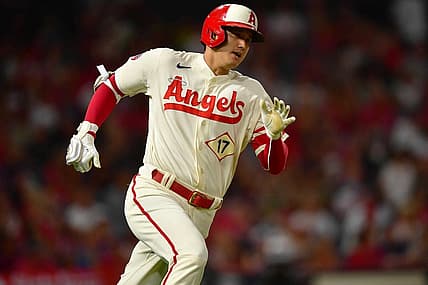 Aug 2, 2022; Anaheim, California, USA; Los Angeles Angels designated hitter Shohei Ohtani (17) runs after hitting a double against the Oakland Athletics during the fifth inning at Angel Stadium. Mandatory Credit: Gary A. Vasquez-USA TODAY Sports