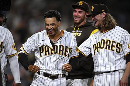 Aug 2, 2022; San Diego, California, USA; San Diego Padres center fielder Trent Grisham (left) celebrates his walk-off home run against the Colorado Rockies with relief pitcher Josh Hader (right) at Petco Park. Mandatory Credit: Orlando Ramirez-USA TODAY Sports