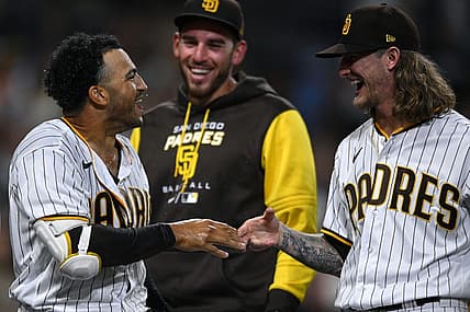 Aug 2, 2022; San Diego, California, USA; San Diego Padres center fielder Trent Grisham (left) celebrates his walk-off home run against the Colorado Rockies with relief pitcher Josh Hader (right) at Petco Park. Mandatory Credit: Orlando Ramirez-USA TODAY Sports