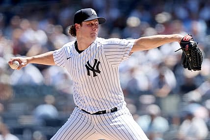 Aug 3, 2022; Bronx, New York, USA; New York Yankees starting pitcher Gerrit Cole (45) pitches against the Seattle Mariners during the first inning at Yankee Stadium. Mandatory Credit: Brad Penner-USA TODAY Sports