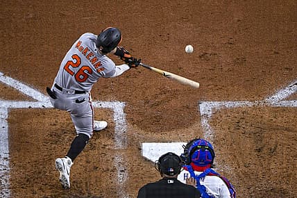 Aug 3, 2022; Arlington, Texas, USA; Baltimore Orioles left fielder Ryan McKenna (26) hits a home run against the Texas Rangers during the second inning at Globe Life Field. Mandatory Credit: Jerome Miron-USA TODAY Sports