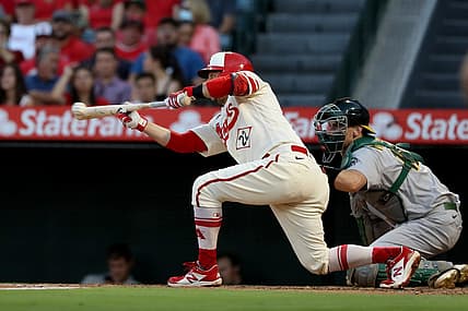 Aug 3, 2022; Anaheim, California, USA;  Los Angeles Angels second baseman David Fletcher (22) sacrifice bunt during the third inning against the Oakland Athletics at Angel Stadium. Mandatory Credit: Kiyoshi Mio-USA TODAY Sports